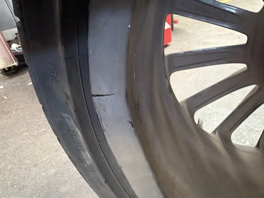 Tyre sidewall damage found during a used-car inspection